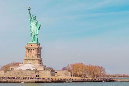 See the Statue of Liberty and Ellis Island